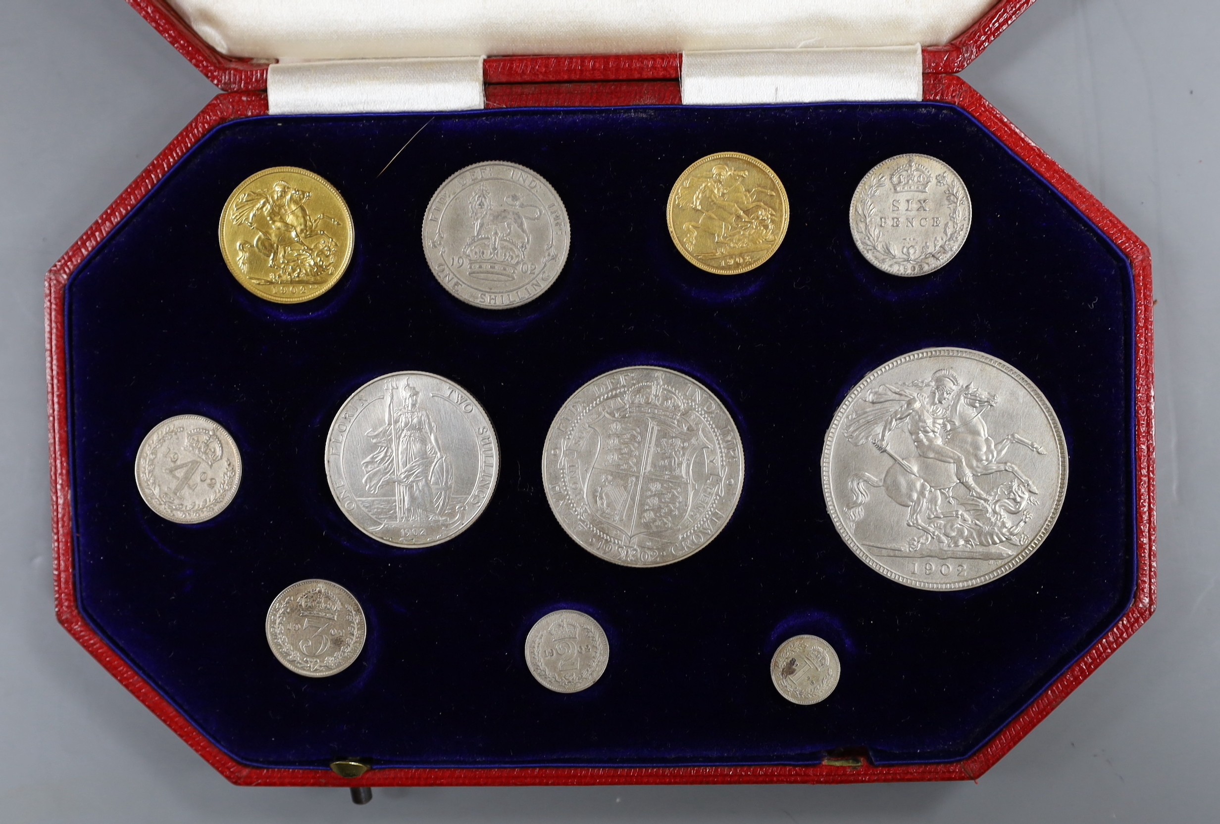 A cased Edward VII eleven-coin specimen set, matt surface, 1902, full gold sovereign through to Maundy 1d, hairlines otherwise near FDC
